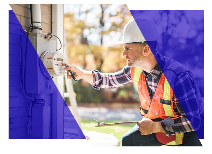 Electrical contractor inspecting electrical equipment at a job site