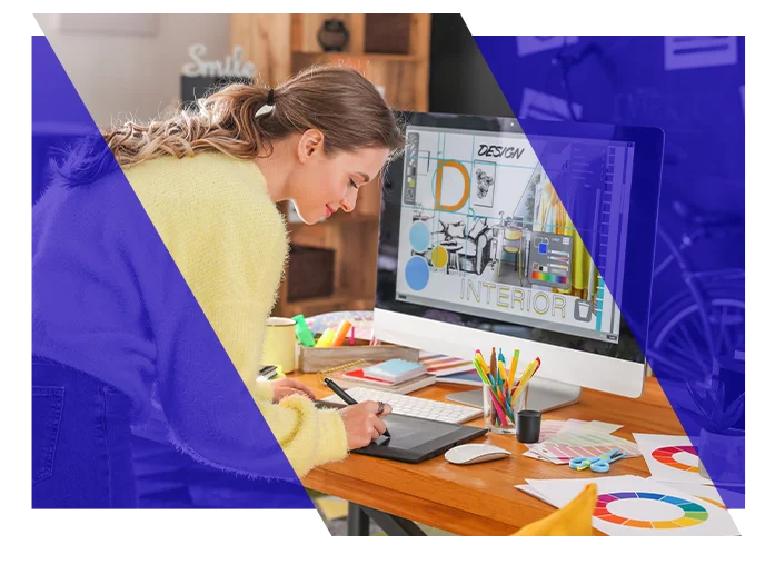 Graphic designer working on a digital design at a computer
