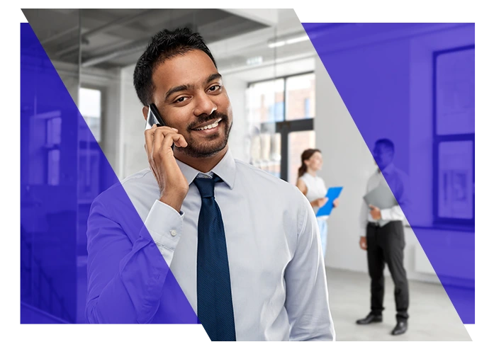 Business professional speaking on the phone in an office