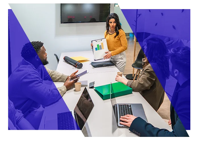 Business professional presenting a recovery plan to colleagues during a meeting
